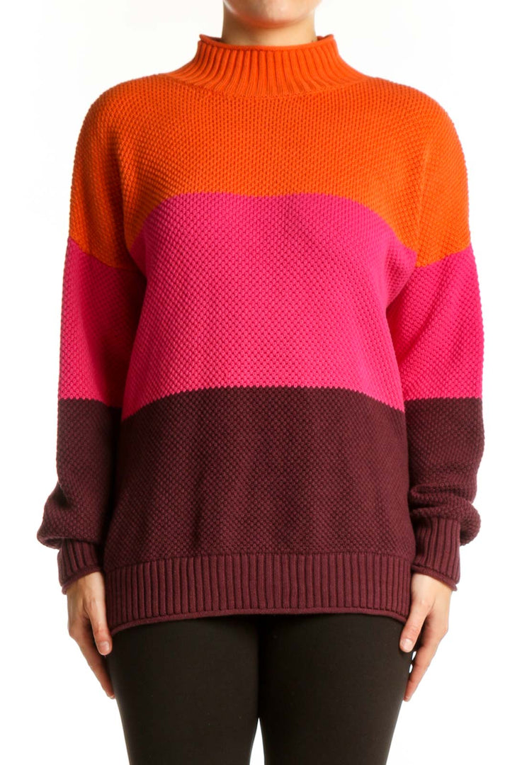 Front view of orange, pink, and burgundy colorblock knit pullover with mock neck by Belle by Kim Gravel