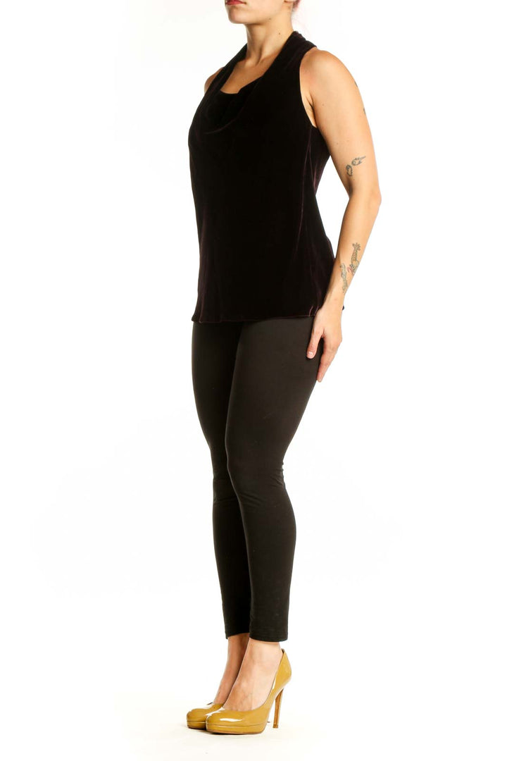 Black velvet halter tank top with draped neckline, front view on model