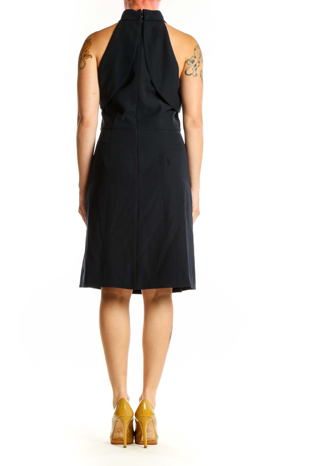 Back view of black halter neck midi dress showing elegant draping and A-line skirt