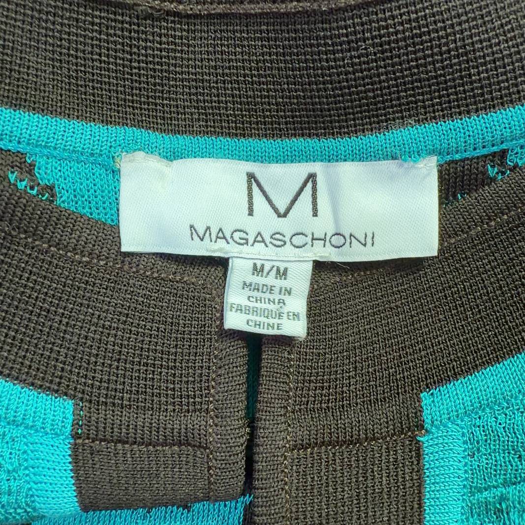 Turquoise and black geometric grid jacket by Magaschoni Collection, back view with three-quarter sleeves