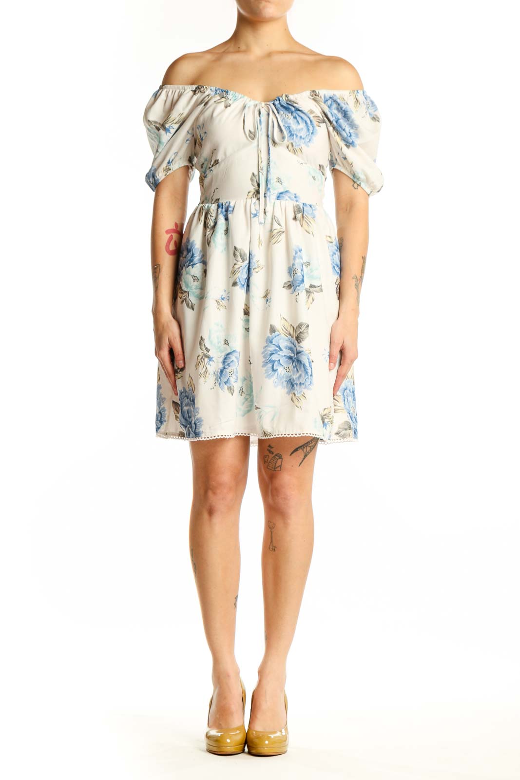 Cream floral off-shoulder dress with blue and green botanical print, short puffed sleeves, and A-line silhouette