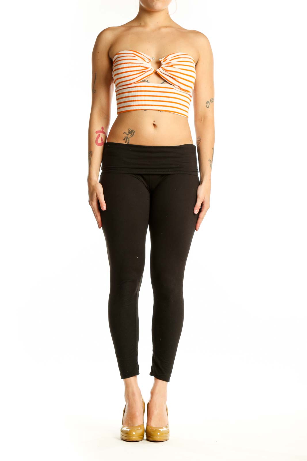 Orange and white striped strapless crop top with sweetheart neckline and center cutout detail, front view