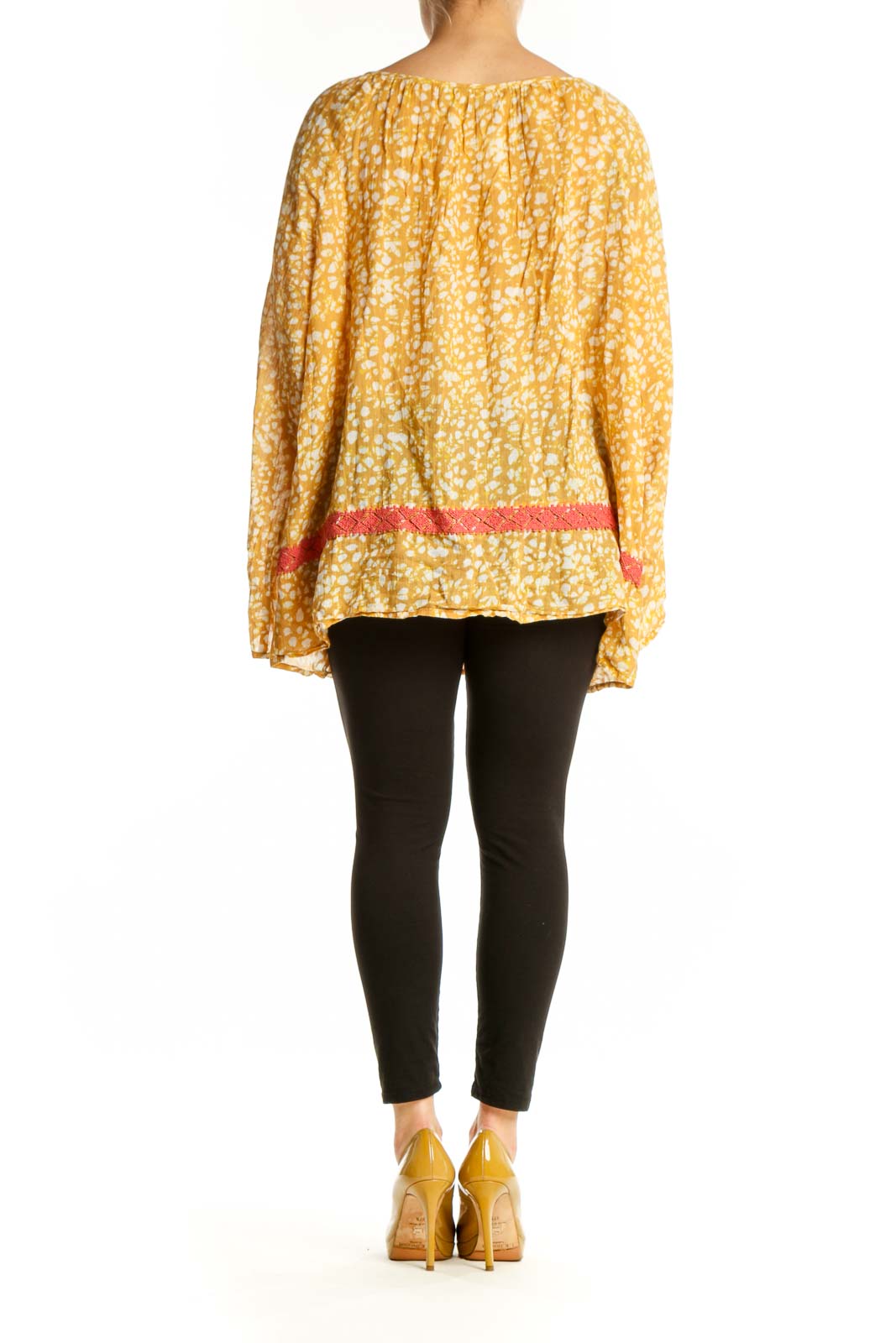 Yellow floral print cotton blouse with bell sleeves and coral trim detail, back view