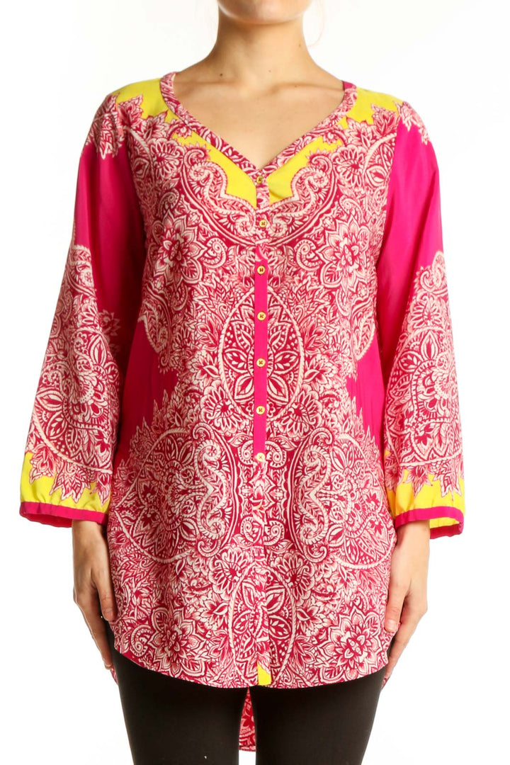 Pink and white paisley Yoana Baraschi tunic top with yellow color-blocking on sleeves and neckline, button-front closure, size L