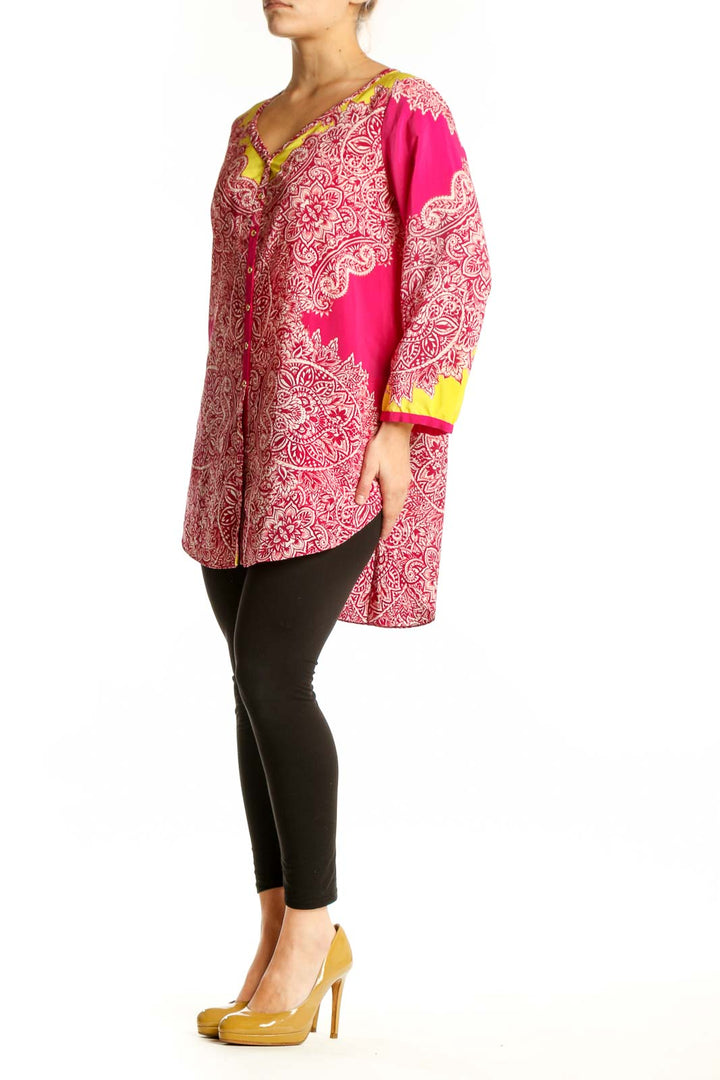 Pink and white paisley Yoana Baraschi tunic top with yellow color-blocking on sleeves and neckline, button-front closure, size L