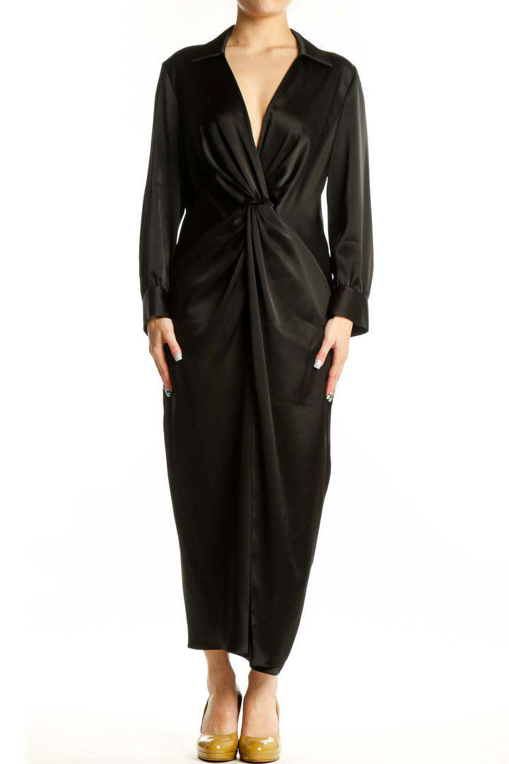 Black wrap midi dress with long sleeves and V-neckline, front view on model