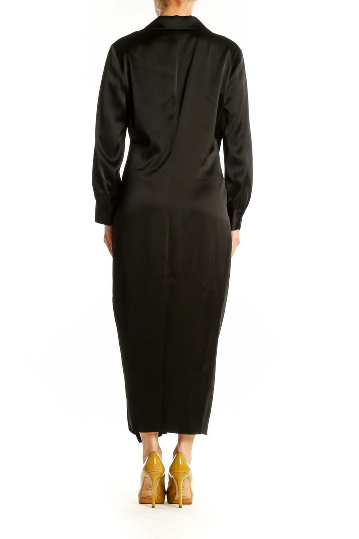 Black wrap midi dress with long sleeves and draped back detail, back view on model