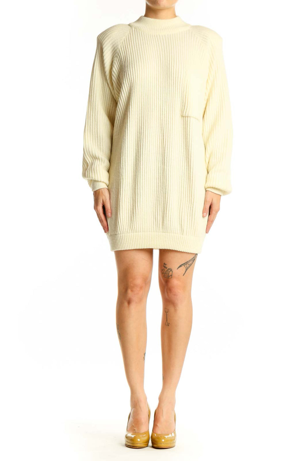 Front view of cream ribbed acrylic sweater dress with crew neckline and long sleeves