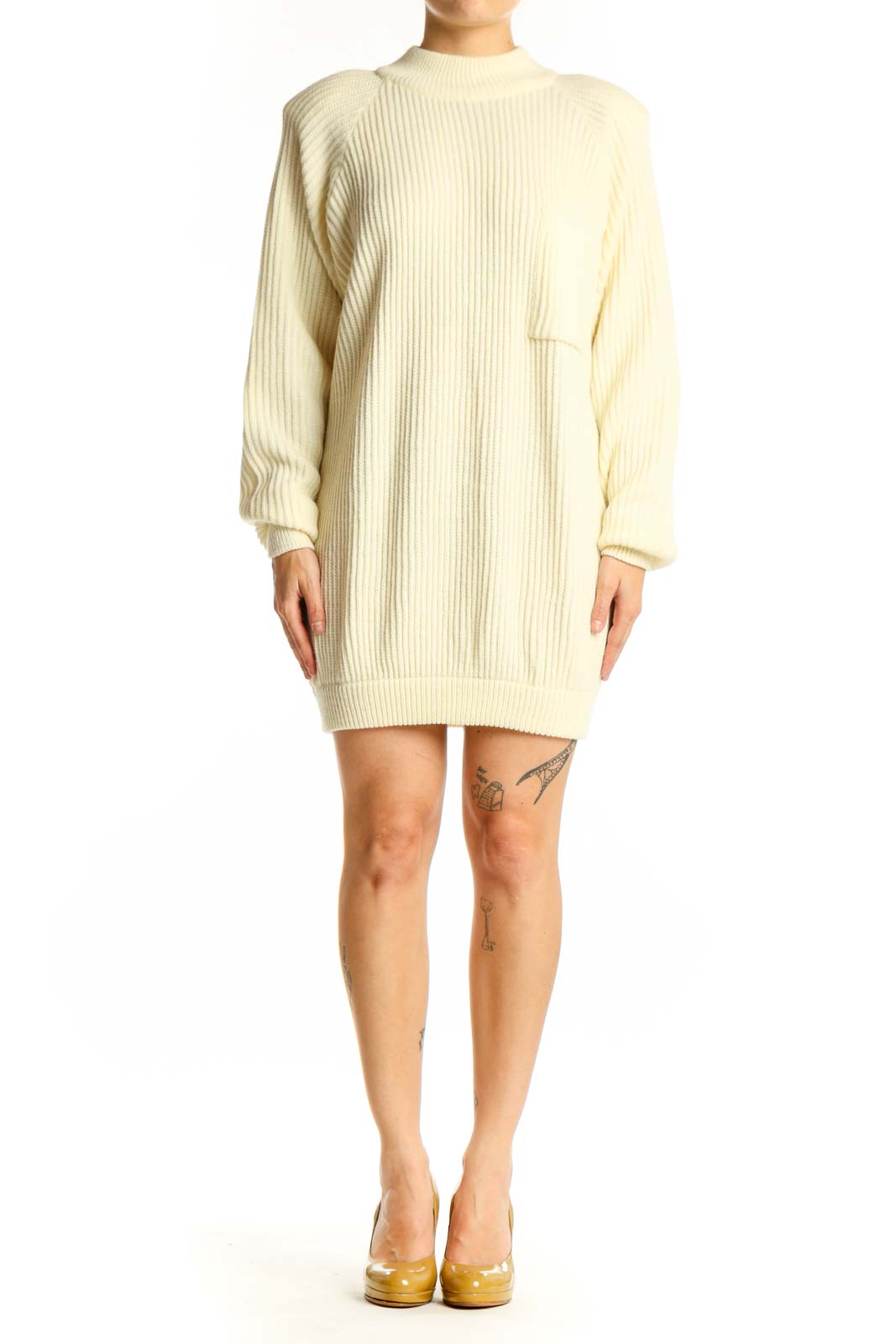 Front view of cream ribbed acrylic sweater dress with crew neckline and long sleeves