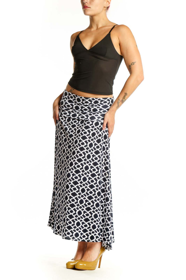Navy and white geometric maxi skirt with A-line silhouette, front view