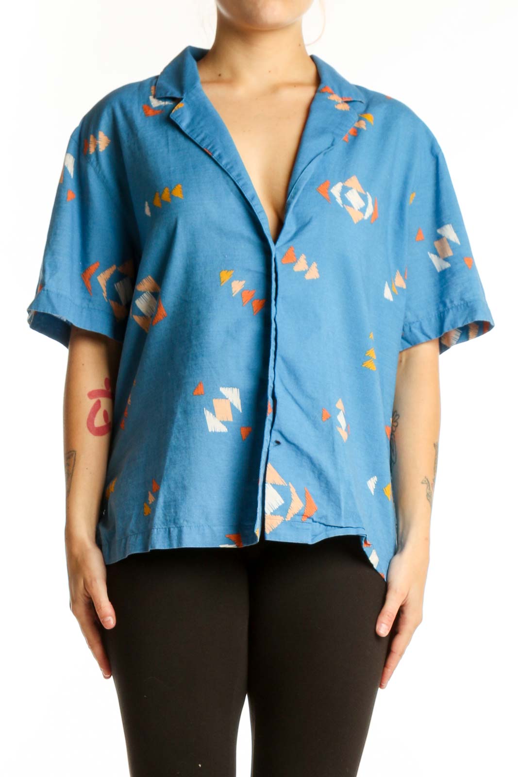 Blue abstract geometric print cotton button-up shirt with short sleeves, front view