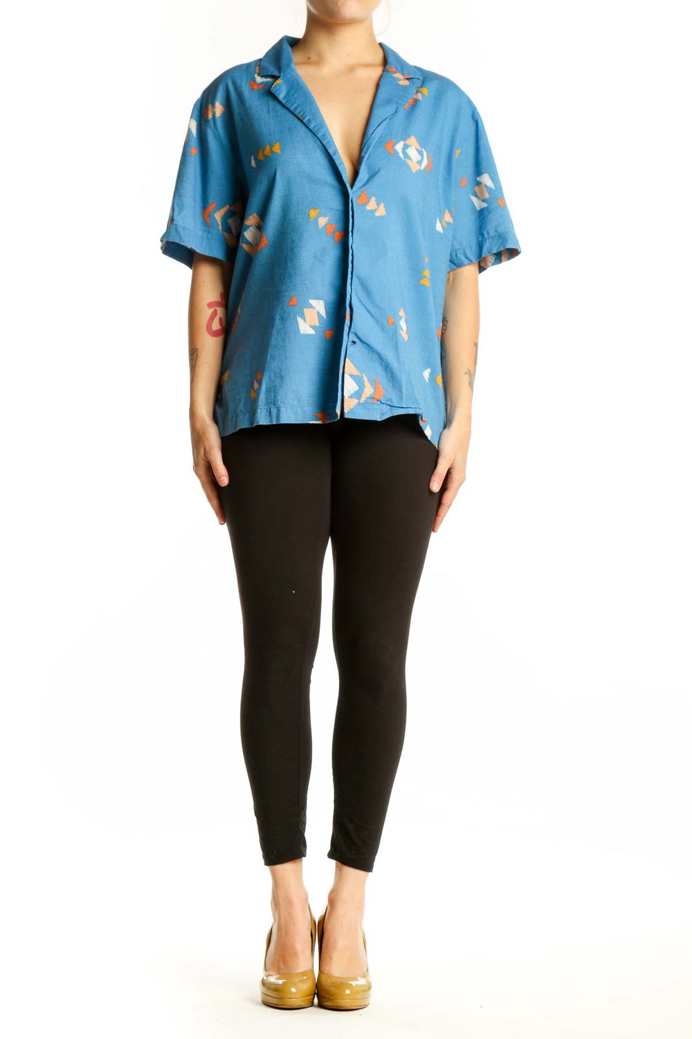 Blue abstract geometric print cotton button-up shirt with short sleeves, front view