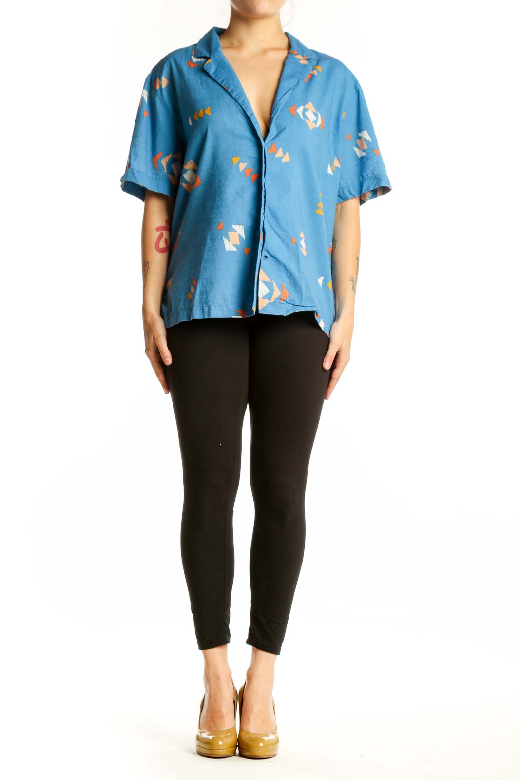 Blue abstract geometric print cotton button-up shirt with short sleeves, front view