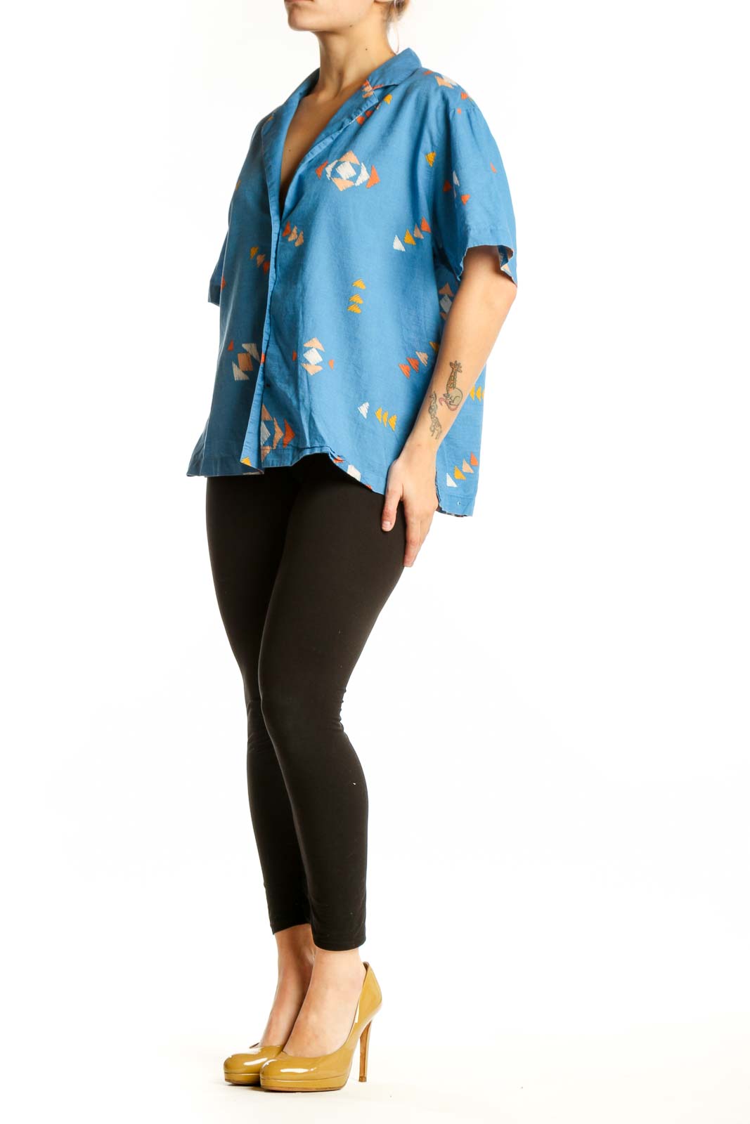Blue abstract geometric print cotton button-up shirt with short sleeves, front view