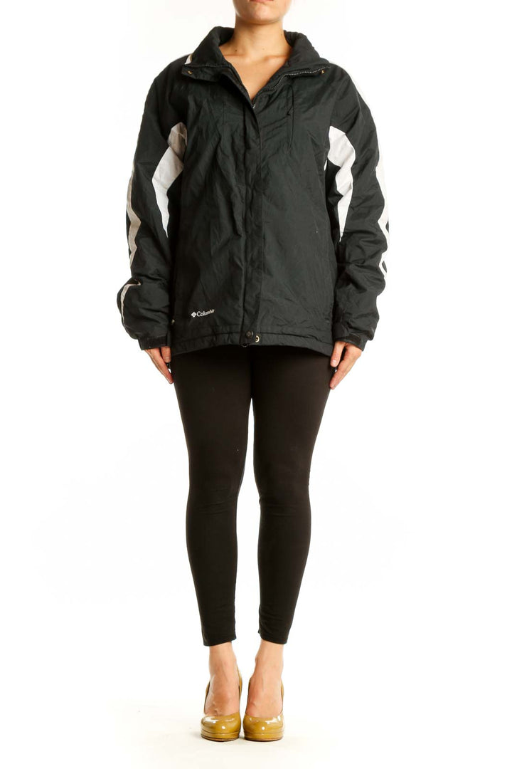 Black Columbia windbreaker jacket with white stripe accents, hooded design, front view on model