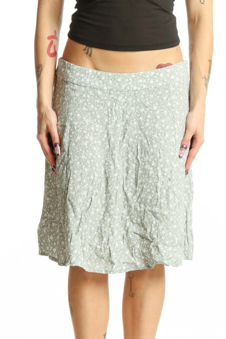 Green floral A-line midi skirt by LOFT, front view showing all-over print and relaxed fit