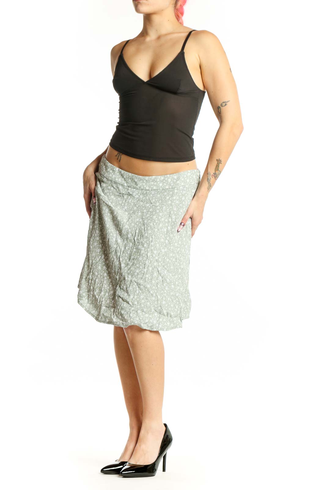 Green floral A-line midi skirt by LOFT, front view showing all-over print and relaxed fit