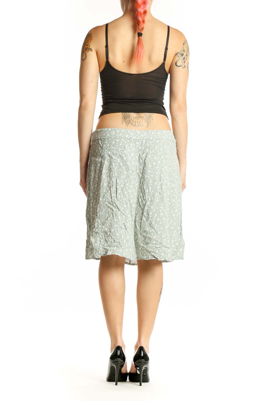 Green floral A-line midi skirt by LOFT, back view displaying draping and knee-length cut