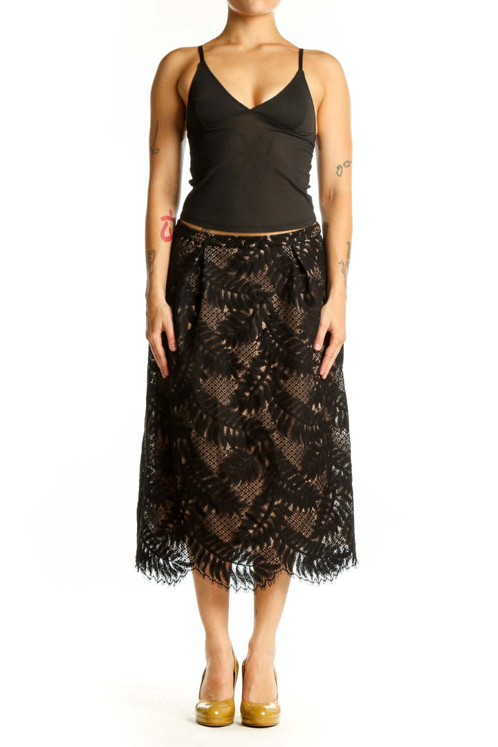Black lace midi skirt with fringe hem and A-line silhouette, front view