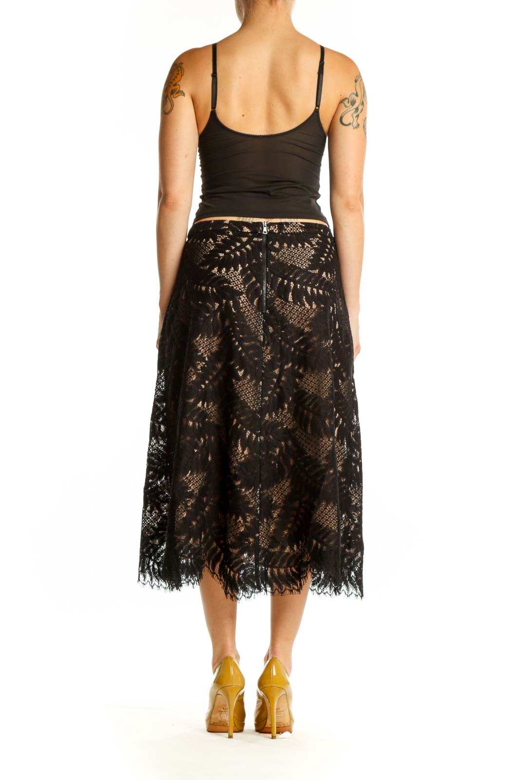 Black lace midi skirt with fringe hem, back view showing lace detail