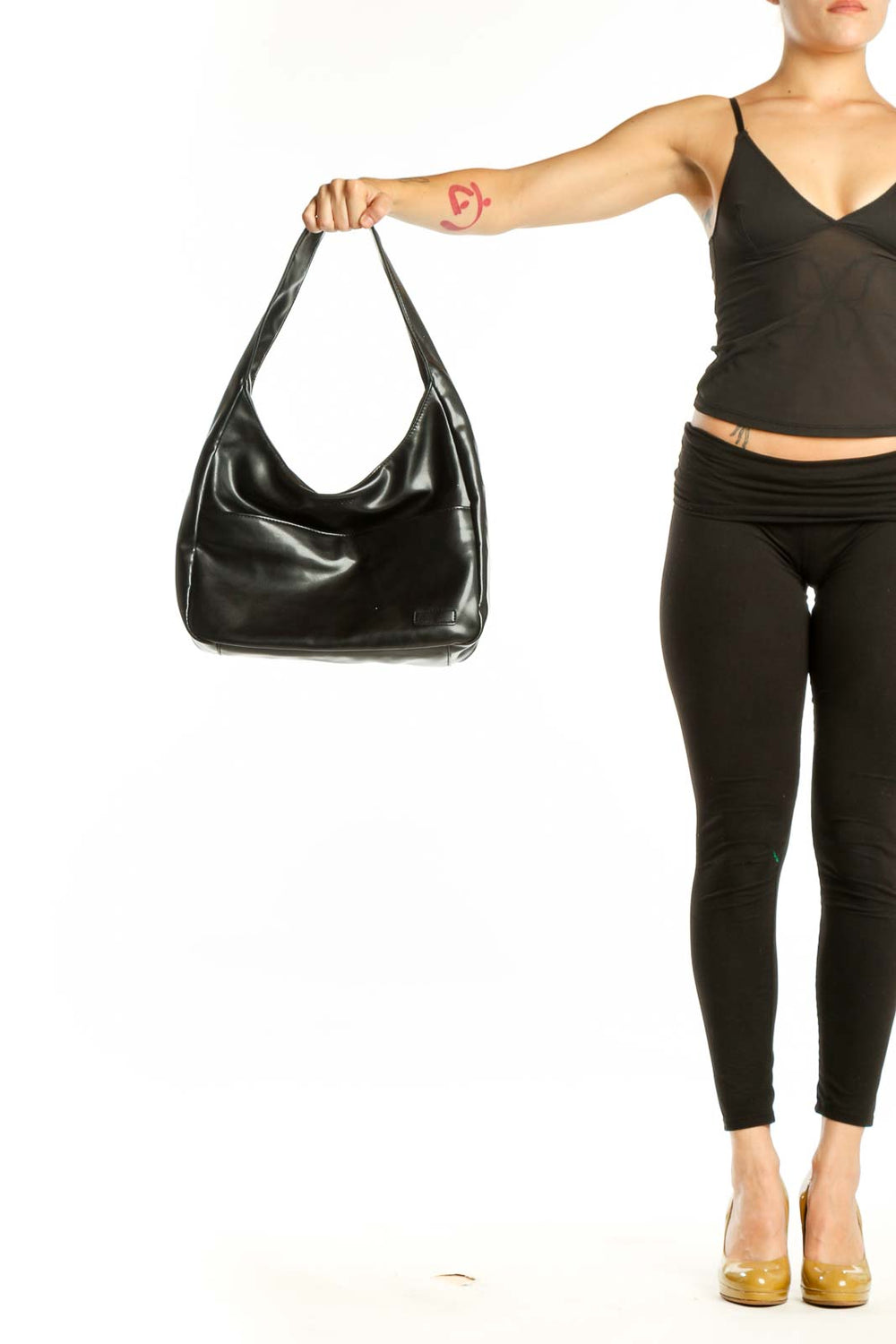 Black leather hobo shoulder bag with comfortable shoulder straps, front view