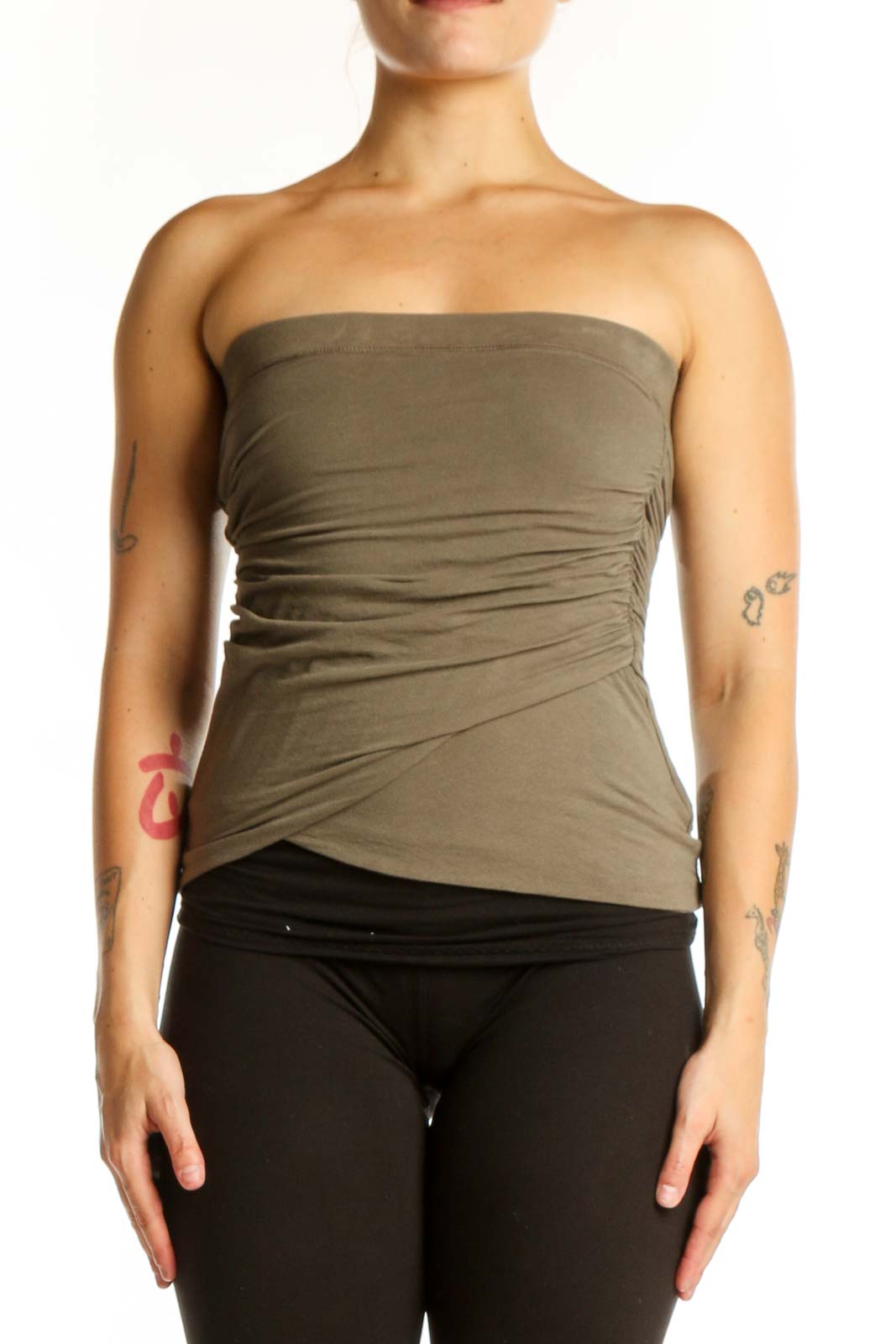 Olive green strapless ruched top with wrap-style design, front view on model