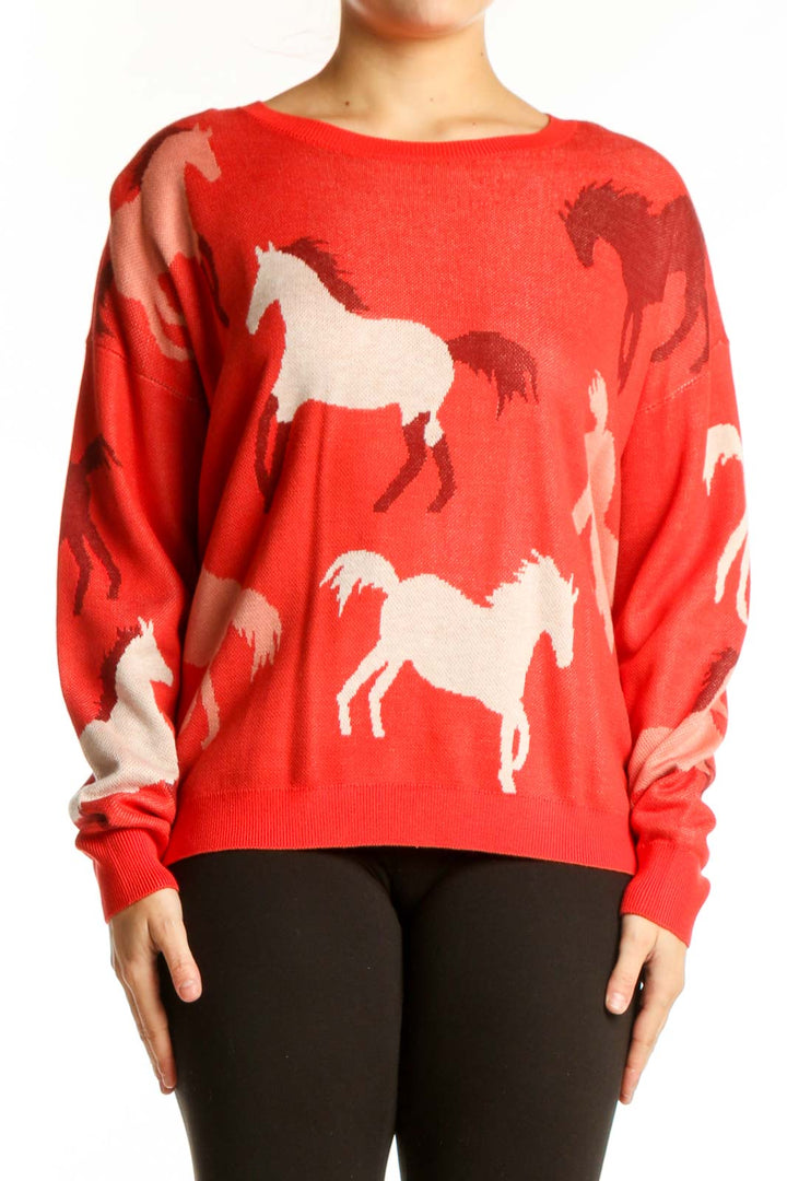 Red horse print knit sweater with cream and burgundy horse motifs, worn with black leggings