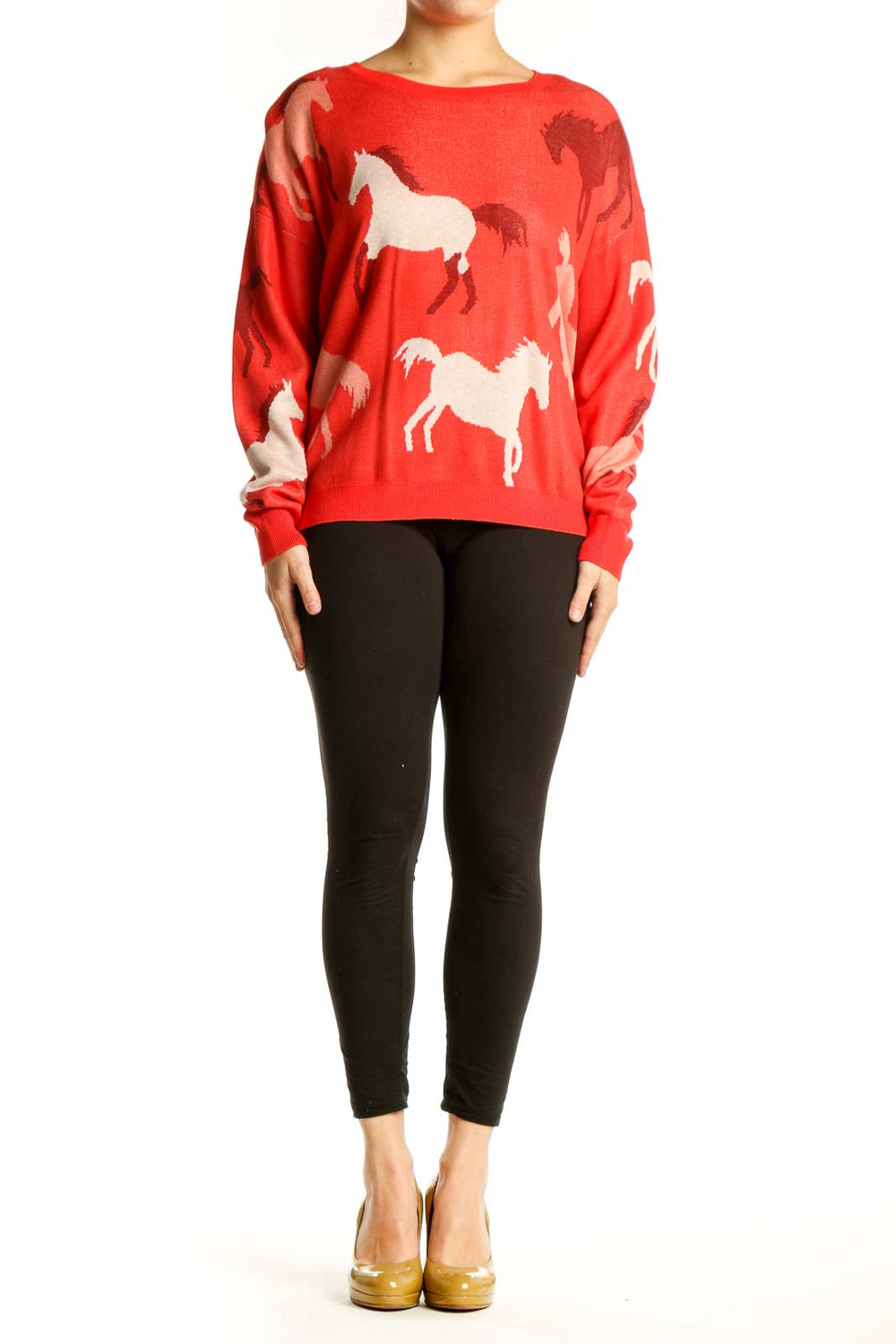 Red horse print knit sweater with cream and burgundy horse motifs, worn with black leggings