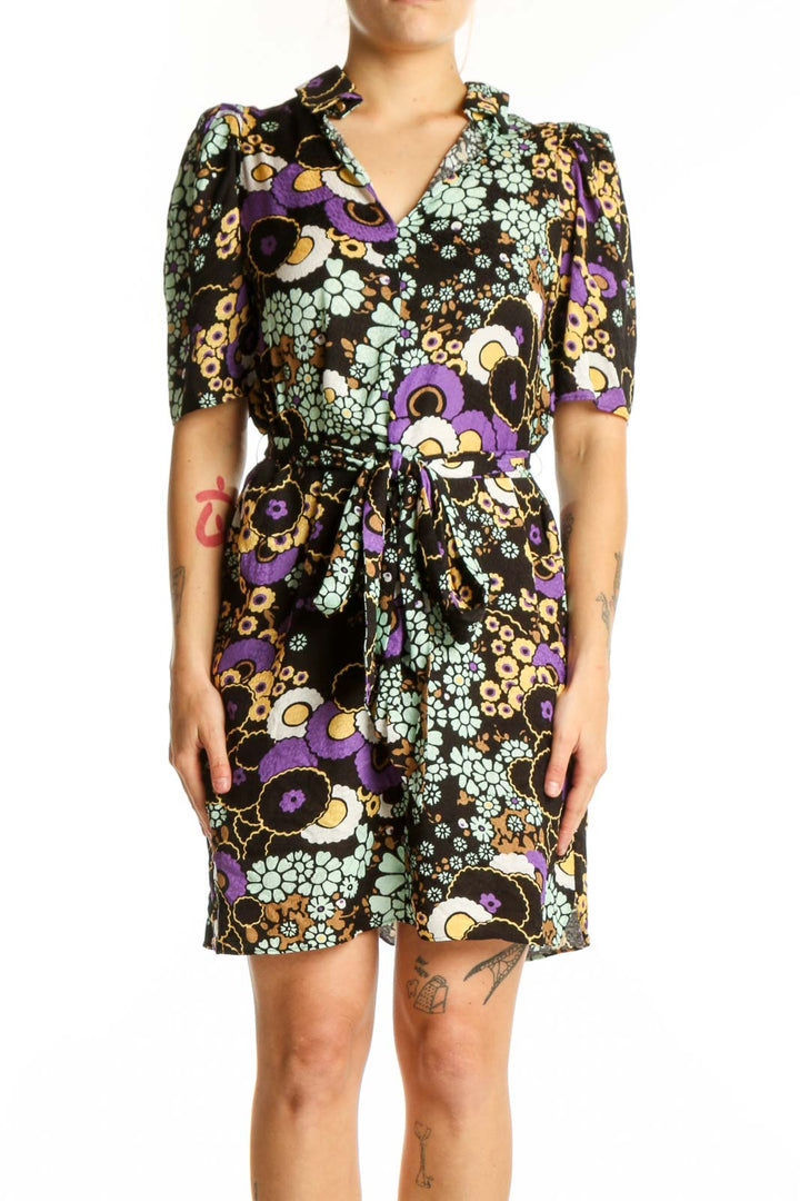Black floral wrap dress with multicolor flowers and puffed sleeves, front view