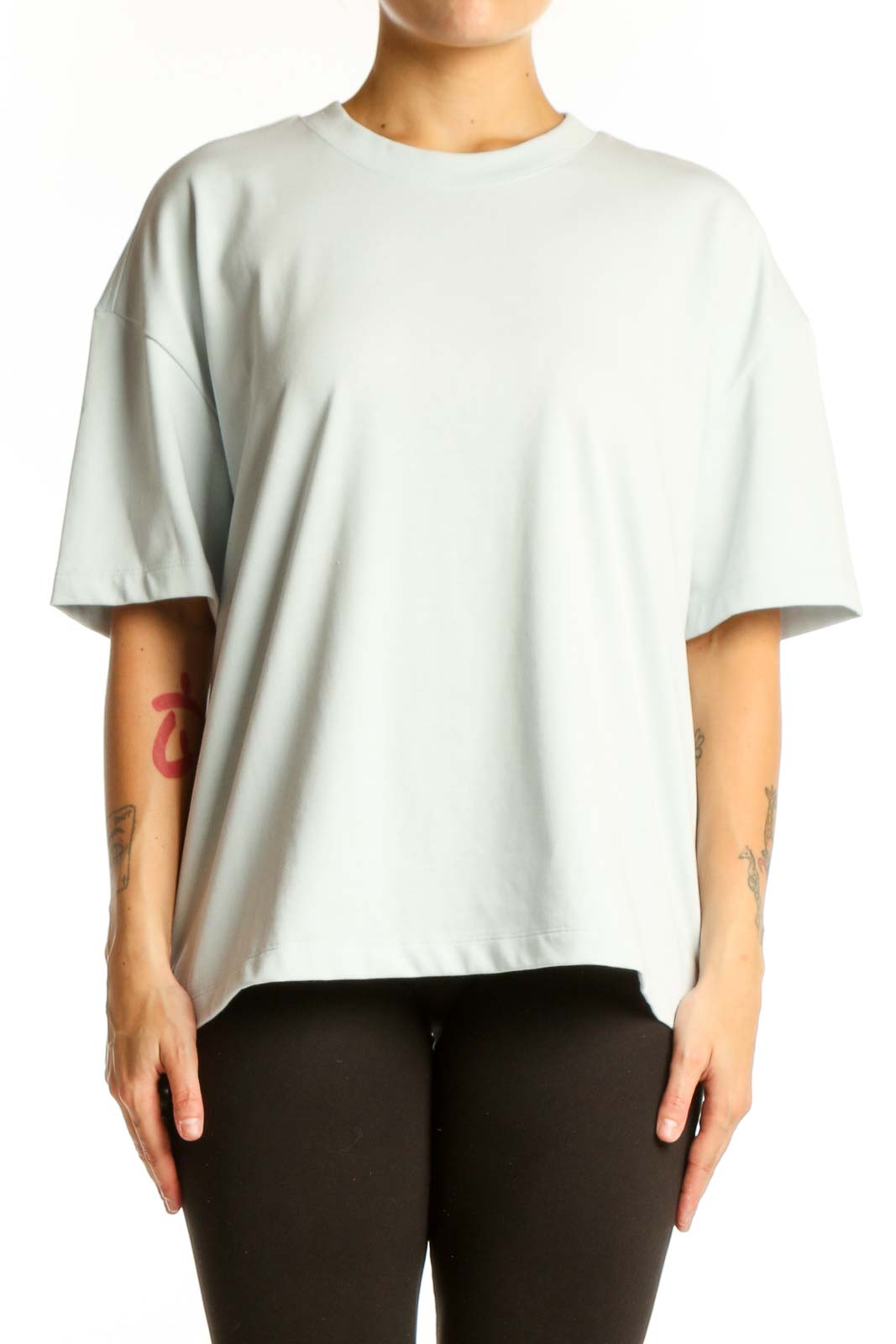 Cream oversized cotton-blend t-shirt with crew neckline and short sleeves, front view