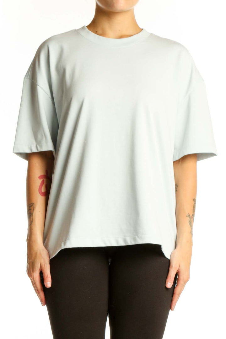 Cream oversized cotton-blend t-shirt with crew neckline and short sleeves, front view