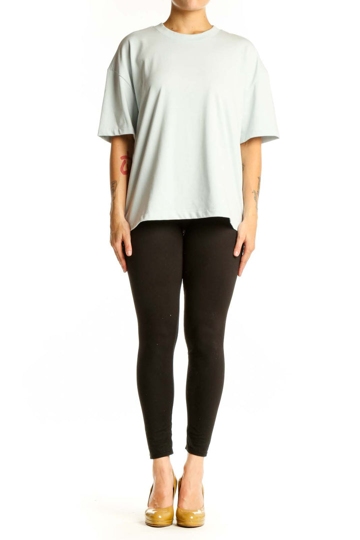 Cream oversized cotton-blend t-shirt with crew neckline and short sleeves, front view