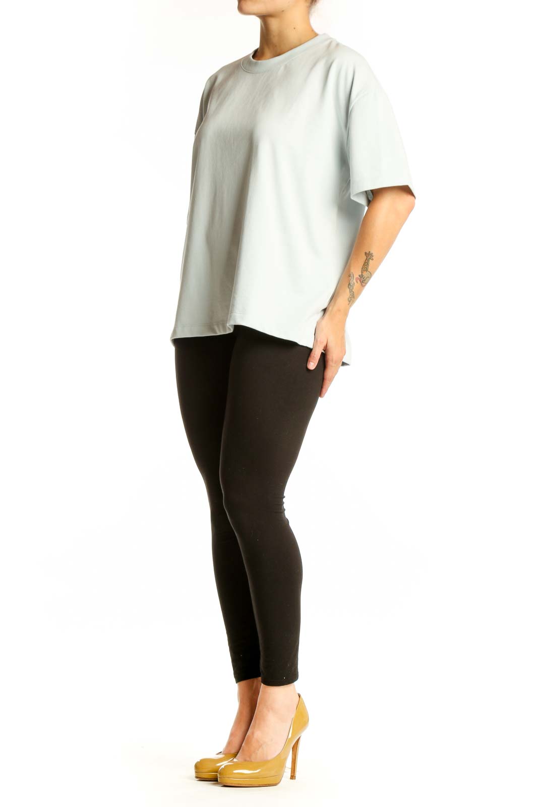 Cream oversized cotton-blend t-shirt with crew neckline and short sleeves, front view