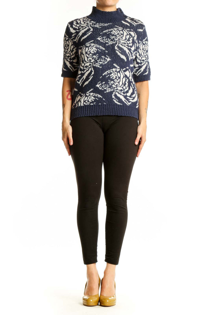 Navy floral jacquard turtleneck sweater with cream botanical pattern, front view