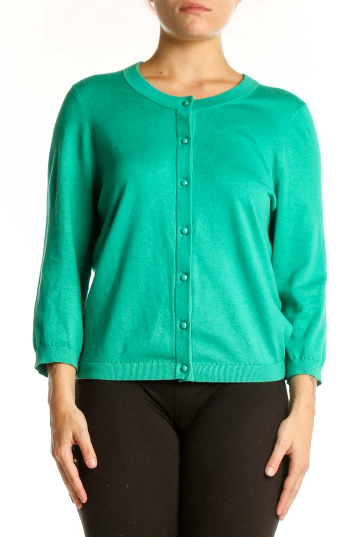 Kate Spade emerald green cashmere blend cardigan with button-front closure and three-quarter sleeves, worn with black pants