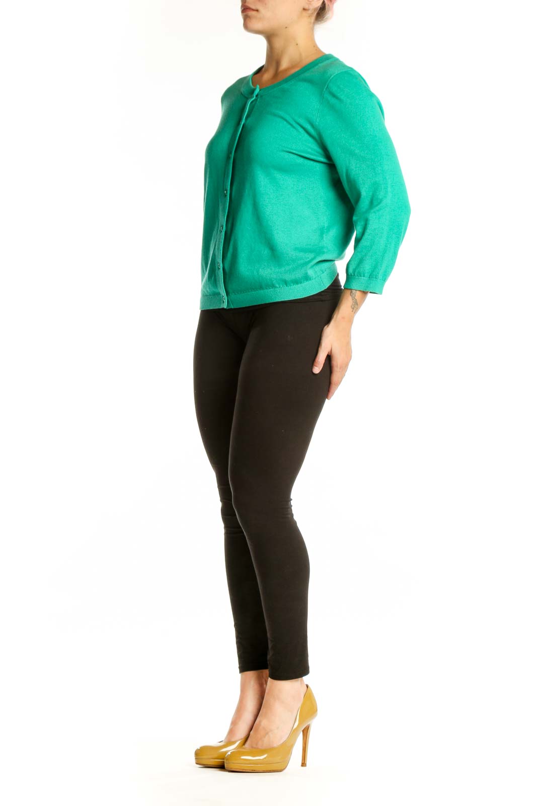 Kate Spade emerald green cashmere blend cardigan with button-front closure and three-quarter sleeves, worn with black pants