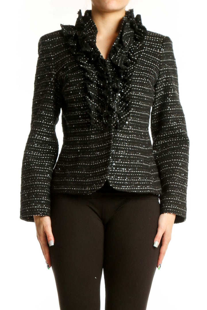 Black studded blazer jacket with rhinestone embellishments and ruffled collar, front view