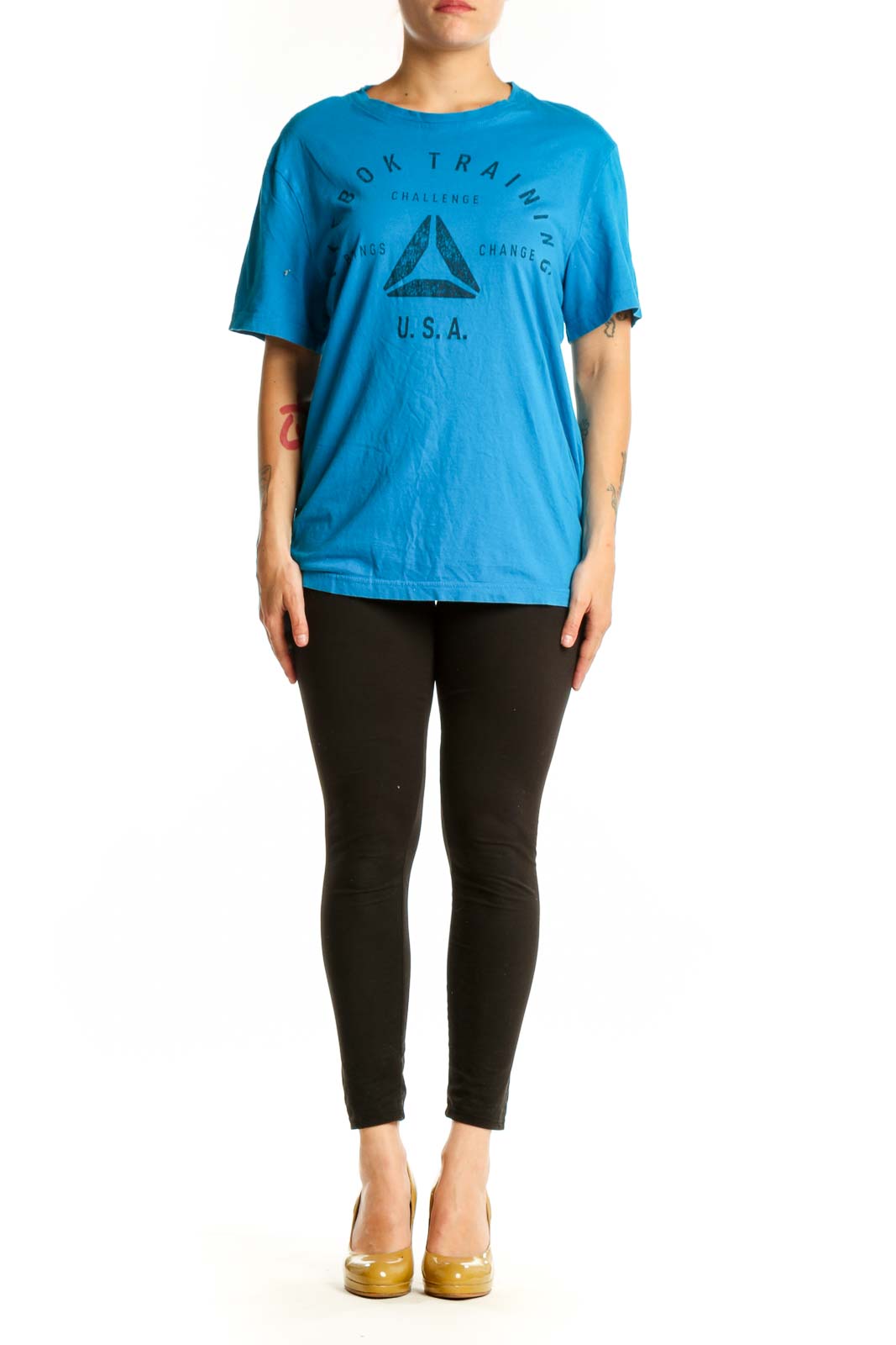Blue Reebok graphic t-shirt with Book Training Challenge logo and triangle design, front view on model