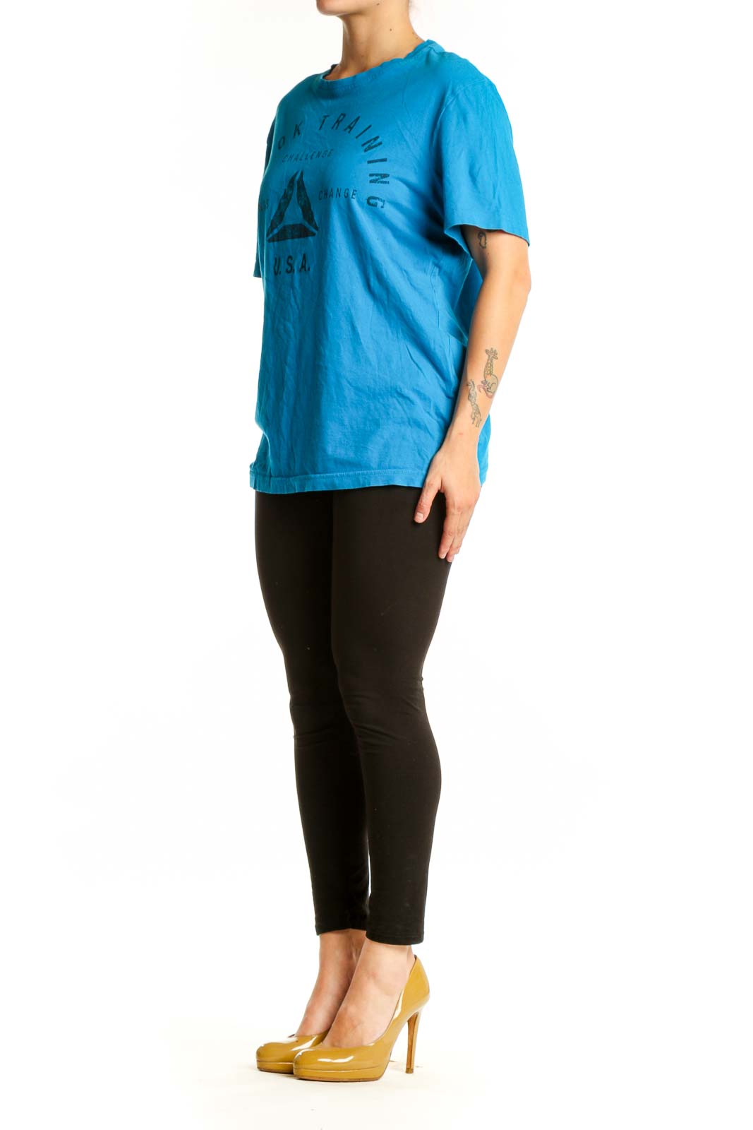 Blue Reebok graphic t-shirt with Book Training Challenge logo and triangle design, front view on model