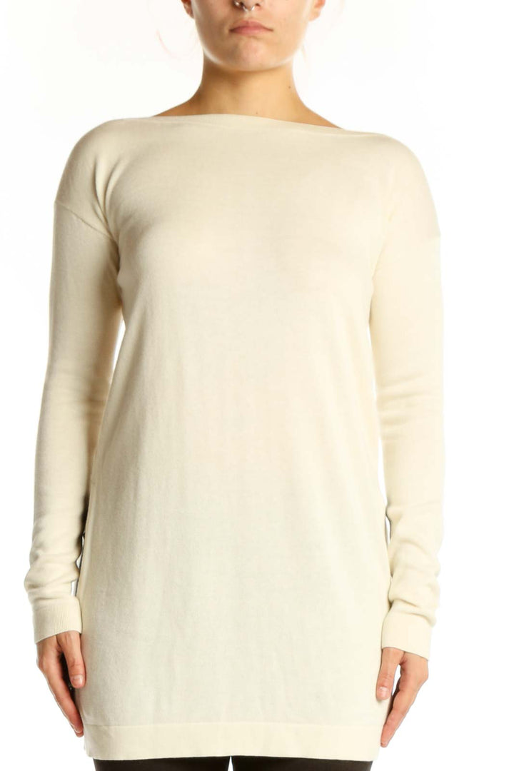 Cream modal pima cotton long sleeve knit with boat neckline, front view on model