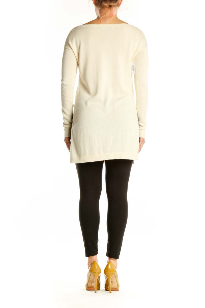 Cream modal pima cotton long sleeve knit, back view showing elongated tunic length