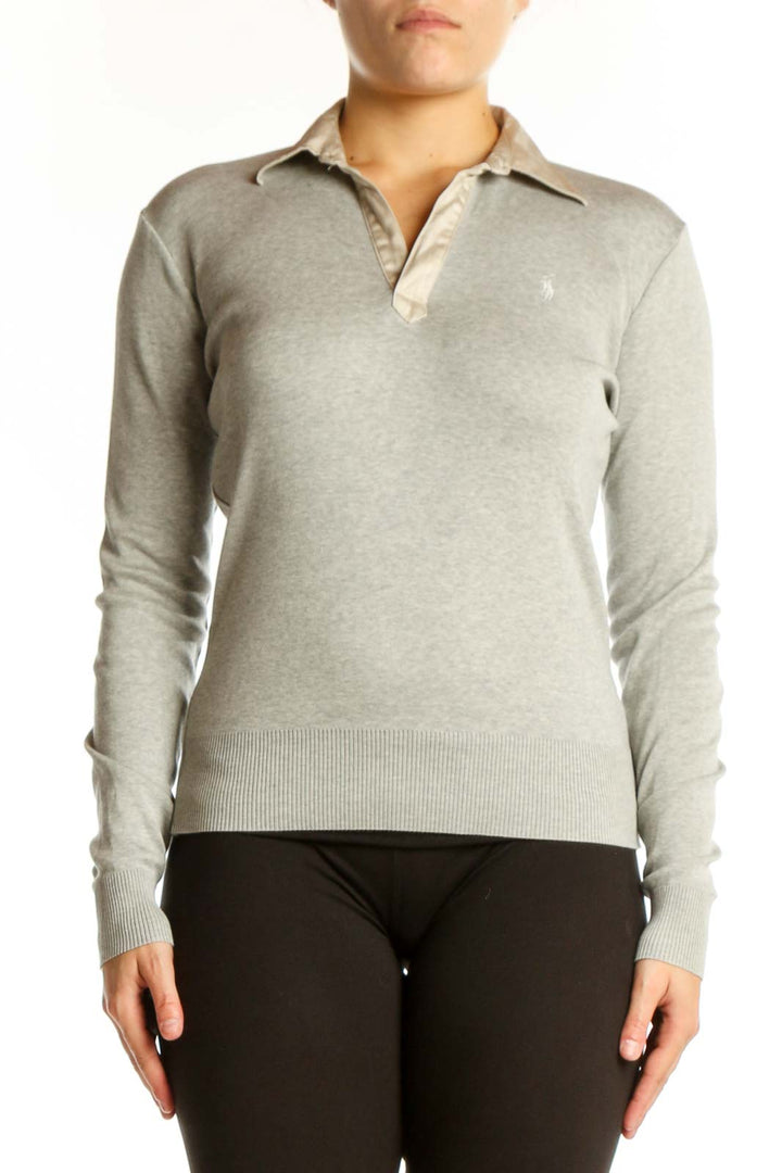Beige cotton long sleeve golf polo with Ralph Lauren embroidered logo and buttoned collar, front view