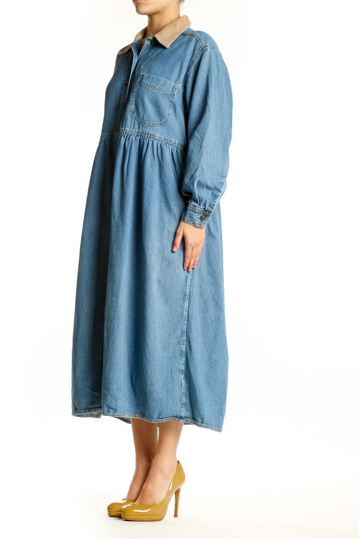 Blue denim button-front shirt dress with collared neckline and gathered waist, front view