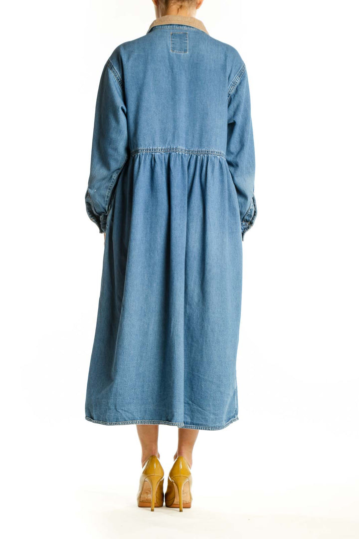 Blue denim button-front shirt dress with A-line silhouette, back view