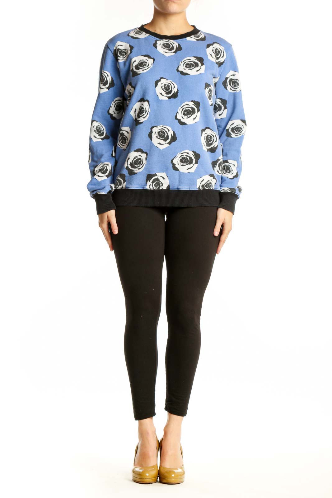 Blue cotton sweatshirt with black and white rose print and black ribbed crew neckline, front view