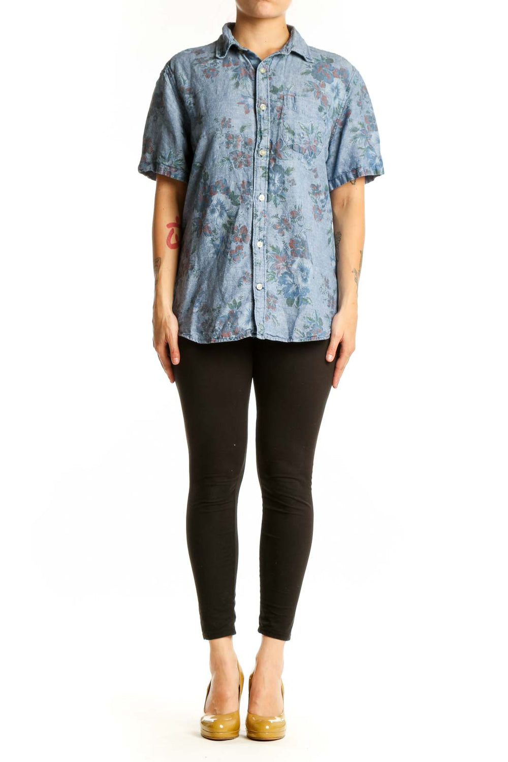 Blue floral button-up shirt with short sleeves and botanical print, front view