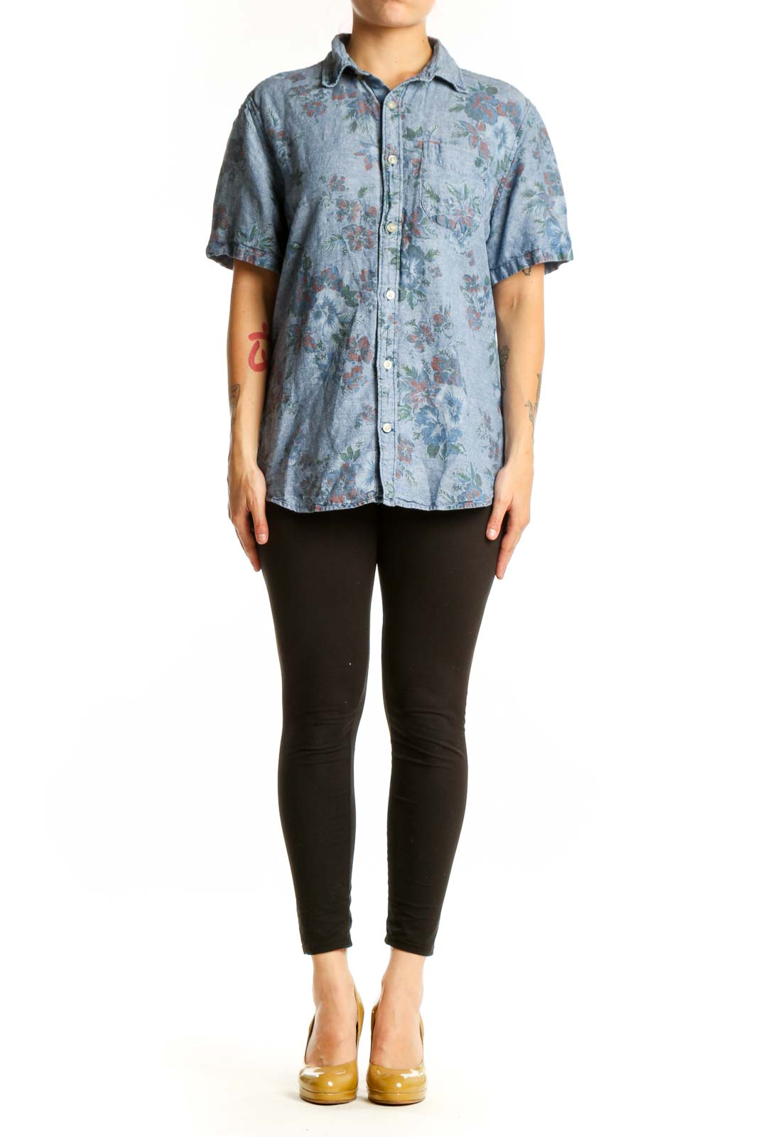 Blue floral button-up shirt with short sleeves and botanical print, front view