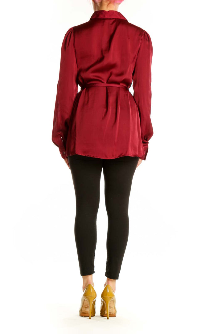 Burgundy button-up shirt with tie waist detail, back view