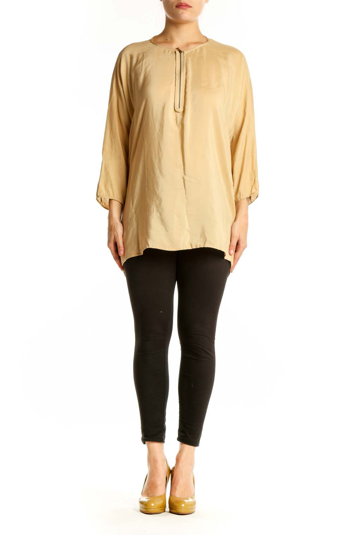 Cream silk tunic top with tie neckline and three-quarter sleeves, front view