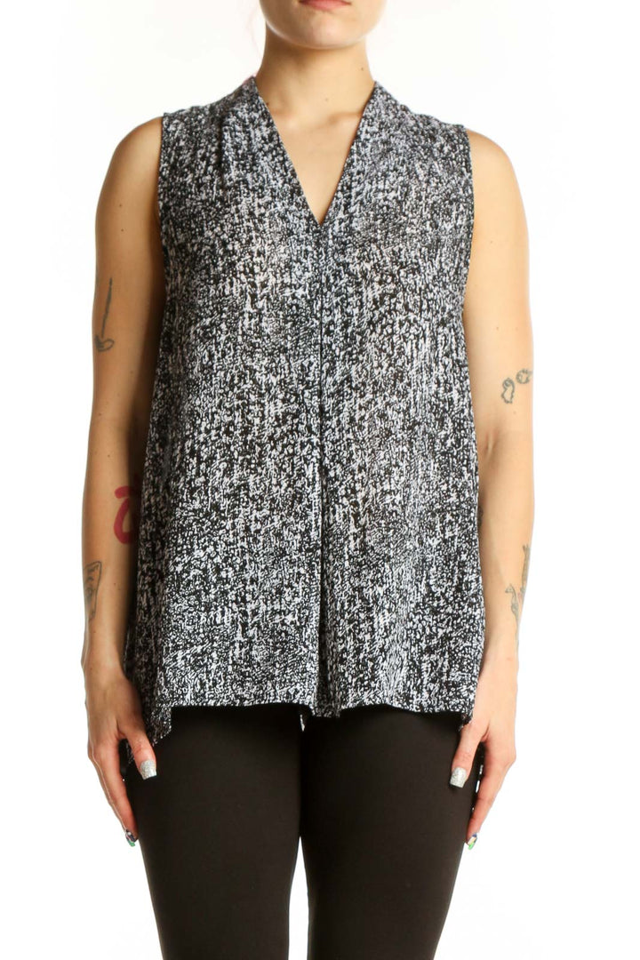Gray speckled sleeveless button-front blouse by Violet & Claire, front view on model